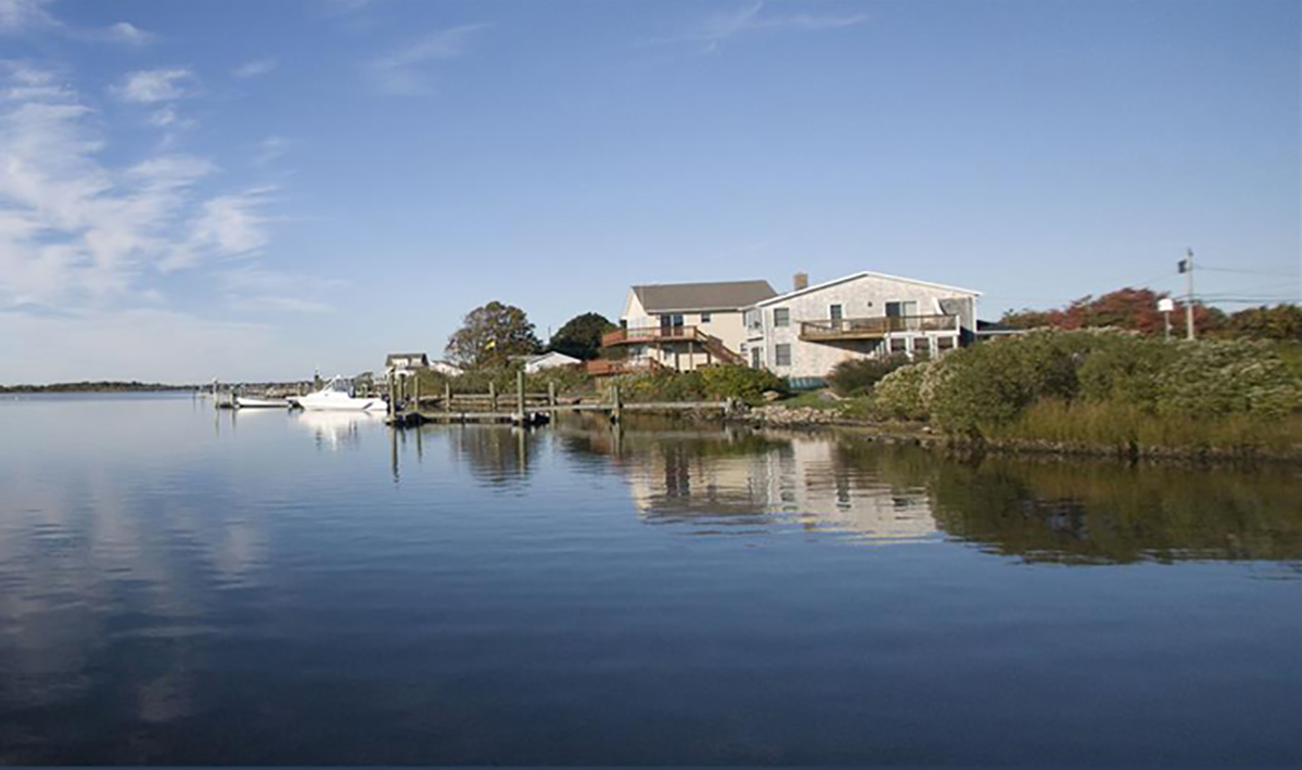 Ninigret Pond with shore showing homes and docks