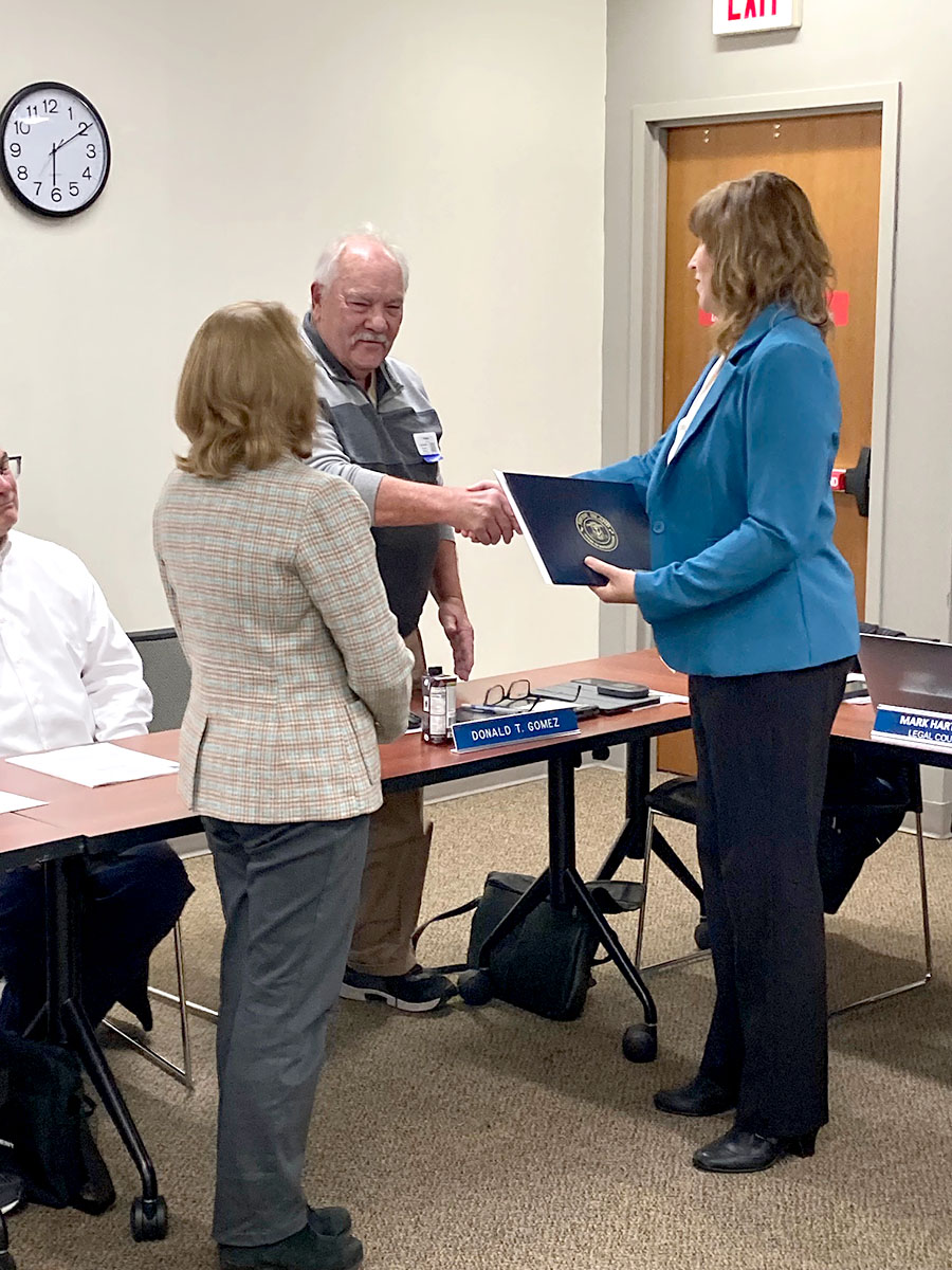 Don Gomez presented  with the citation for his years of service to the Council