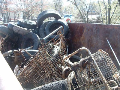 Full dumpster after a day of cleaning the river